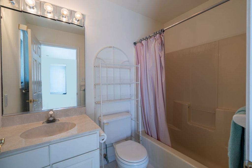 12 82nd Street, Unit NORTH Sea Isle City, NJ 08243 - Photo 26 of 26 a bathroom with a sink a toilet and shower