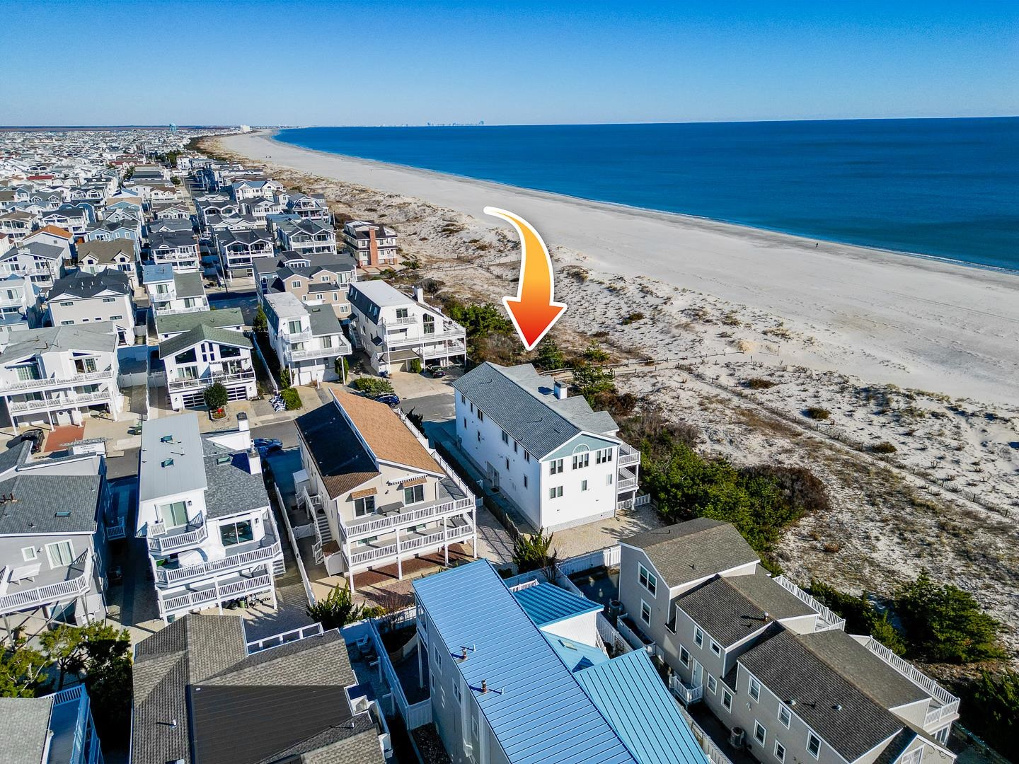 12 82nd Street, Unit NORTH Sea Isle City, NJ 08243 - Photo 6 of 26 an aerial view of residential houses with outdoor space
