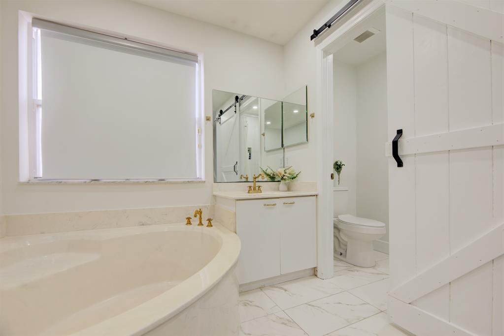 724 Northwest 155th Terrace Pembroke Pines, FL 33028 - Photo 25 of 46 a bathroom with a sink a toilet and shower