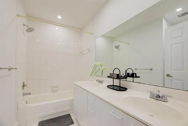 a bathroom with a sink and a bathtub