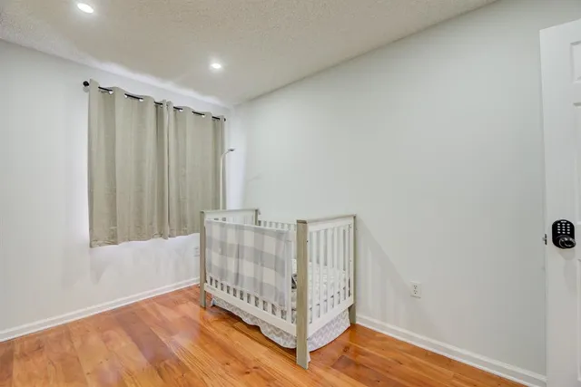 a view of entryway with wooden floor