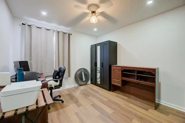 a room with a bed and furniture