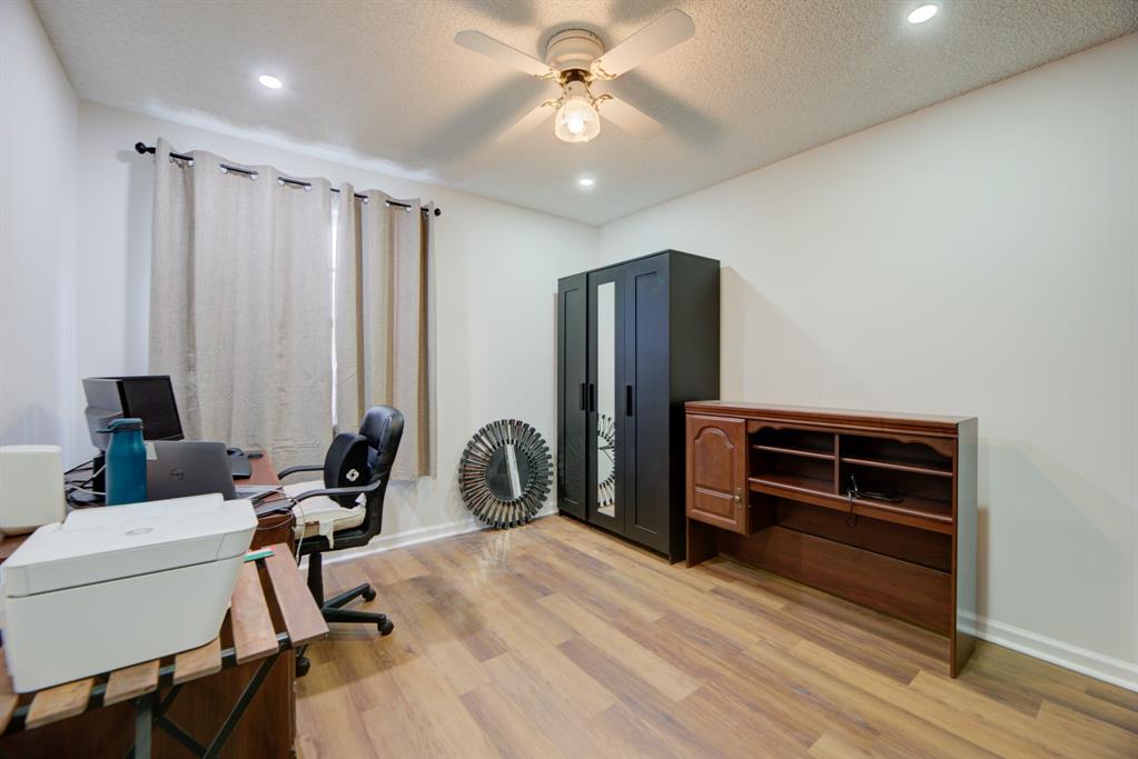 724 Northwest 155th Terrace Pembroke Pines, FL 33028 - Photo 34 of 46 a room with a bed and furniture