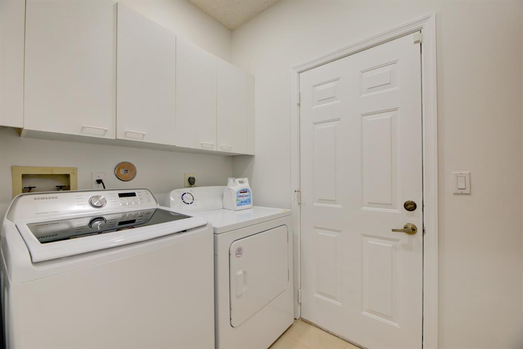 724 Northwest 155th Terrace Pembroke Pines, FL 33028 - Photo 38 of 46 a utility room with dryer and washer