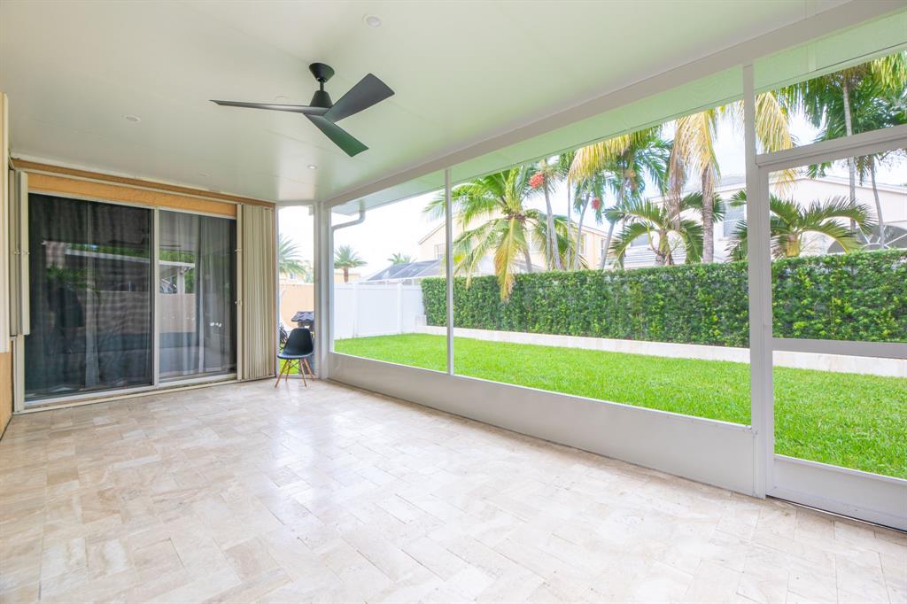 724 Northwest 155th Terrace Pembroke Pines, FL 33028 - Photo 40 of 46 a view of a garden with an outdoor space