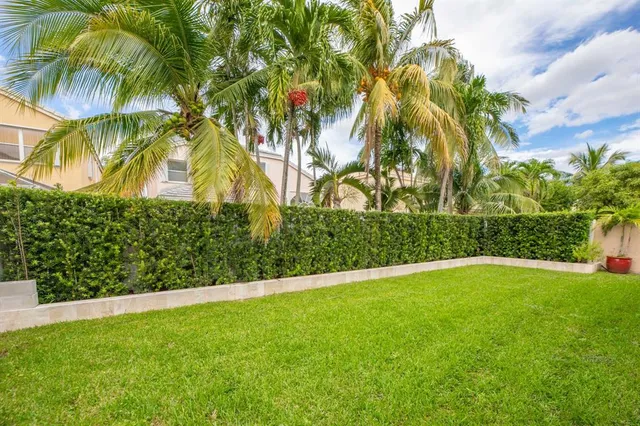a view of a backyard with a garden