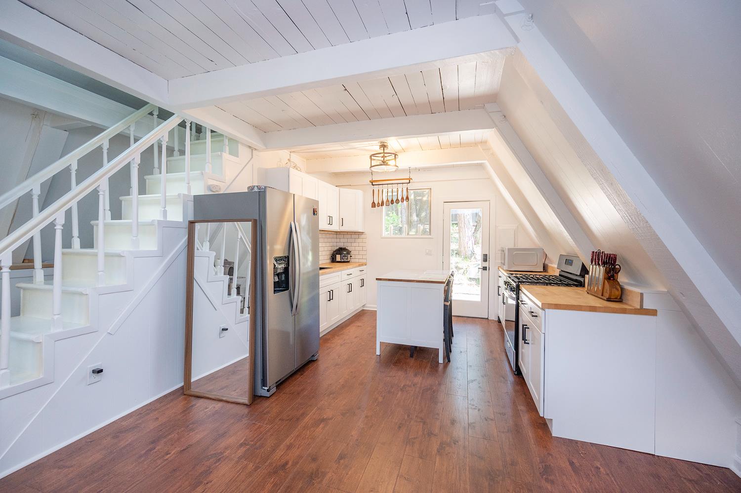 6141 Sweeney Road Somerset, CA 95684 - Photo 19 of 67 a view of a kitchen with furniture and wooden floor