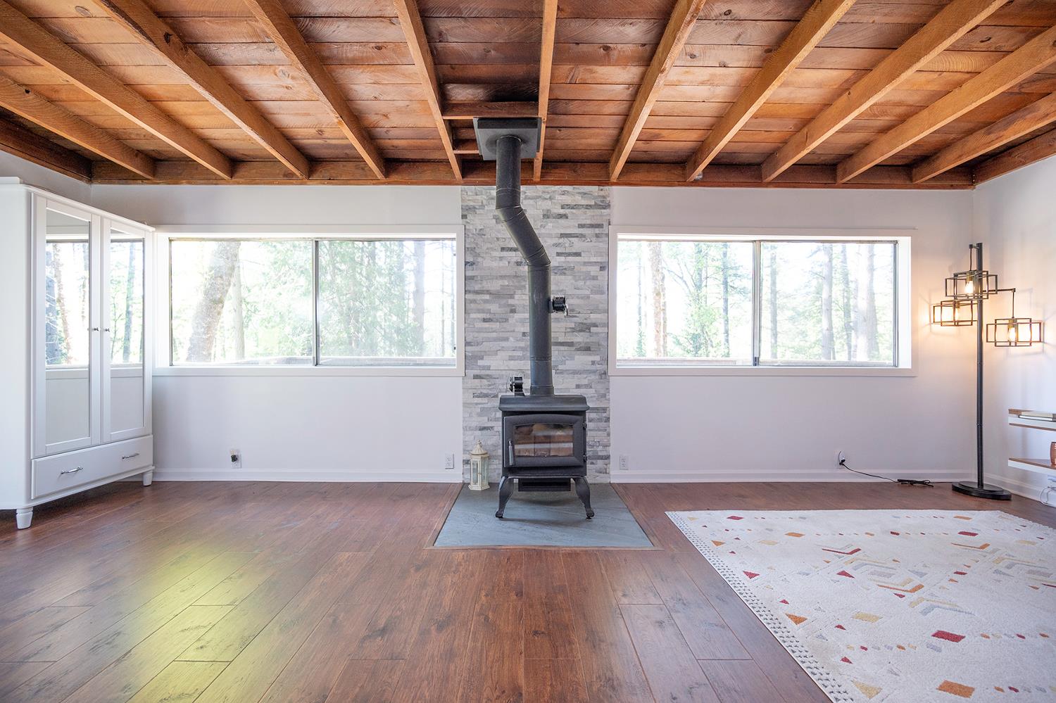 6141 Sweeney Road Somerset, CA 95684 - Photo 9 of 67 a view of a room with wooden floor and windows