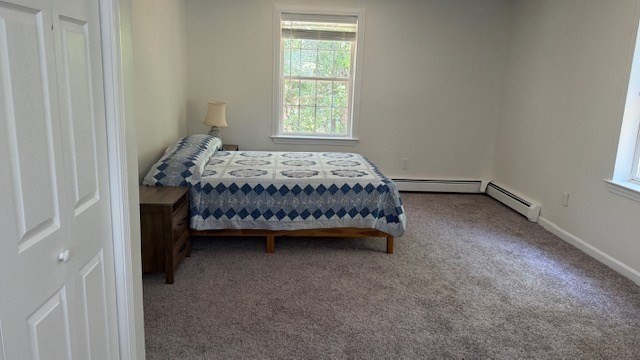 34 Kent Road Westminster, MA 01473 - Photo 25 of 30 a bed sitting in a bedroom next to a window