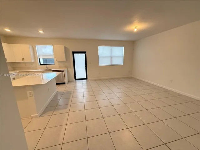 a view of an empty room with window