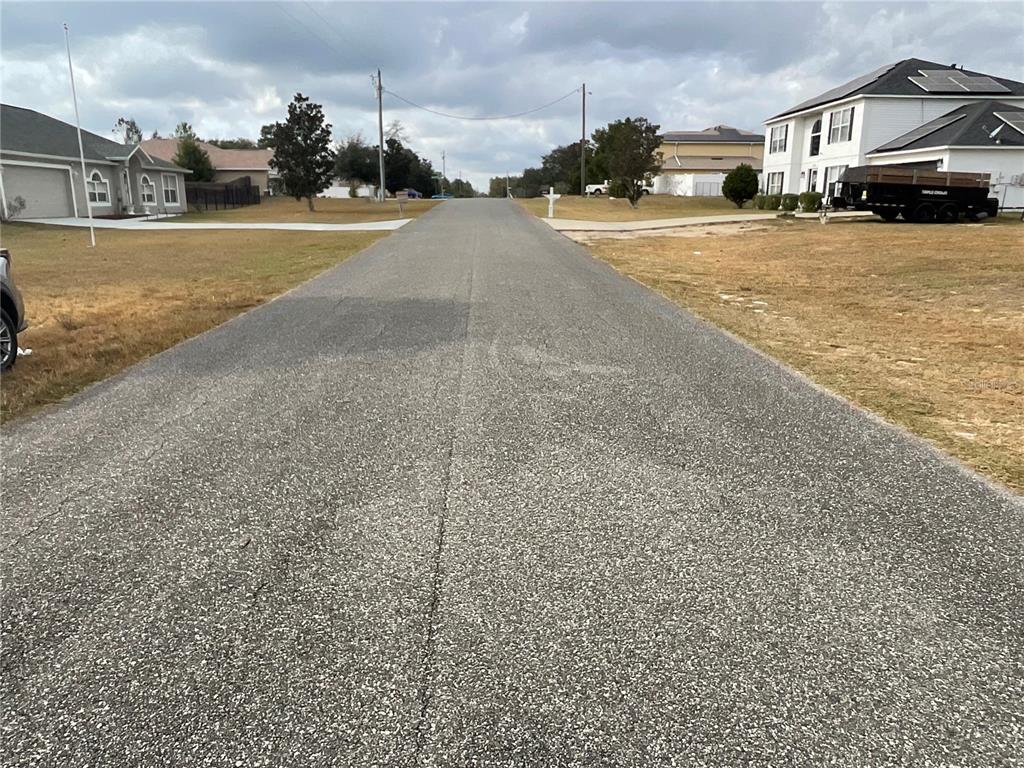 Tbd Southwest 110th Lane Ocala, FL 34476 - Photo 3 of 7 a view of street with cars