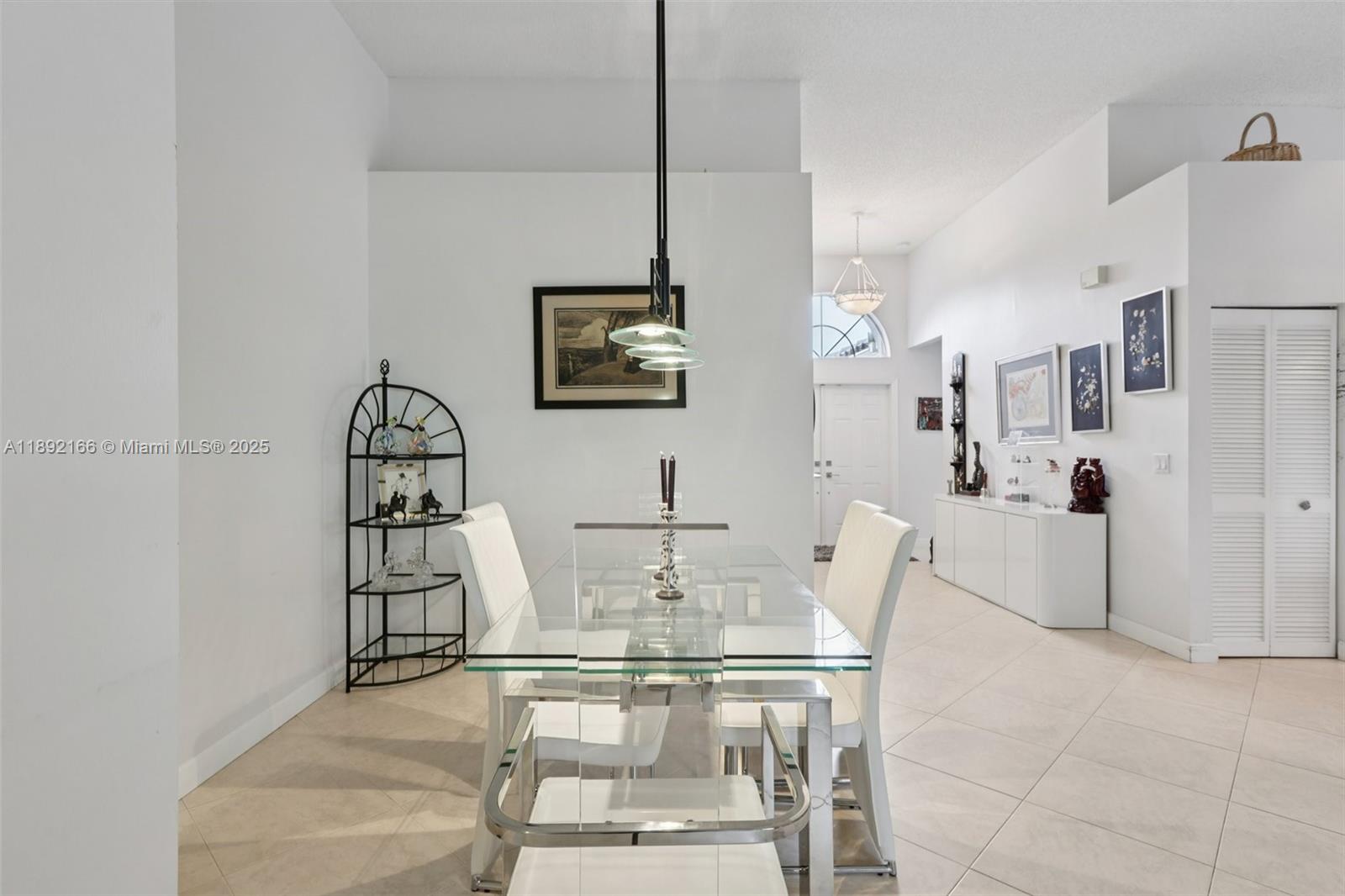 8752 Northwest 75th Court Tamarac, FL 33321 - Photo 10 of 26 a view of a dining room with furniture
