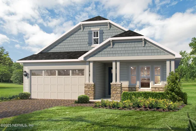 front view of a house with a yard