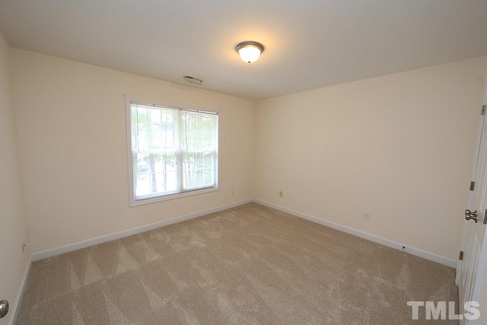 6020 Brambleberry Way Raleigh, NC 27616 - Photo 11 of 14 Third bedroom features walk-in closet.
