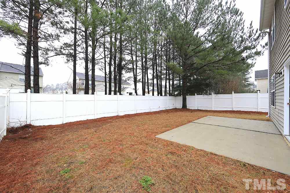 6020 Brambleberry Way Raleigh, NC 27616 - Photo 12 of 14 Great fenced backyard with patio.