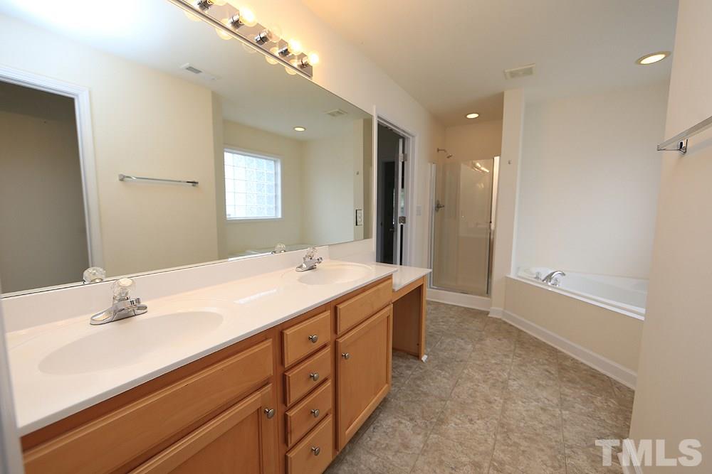 6020 Brambleberry Way Raleigh, NC 27616 - Photo 7 of 14 Great master bath with garden tub, separate shower and double vanities.