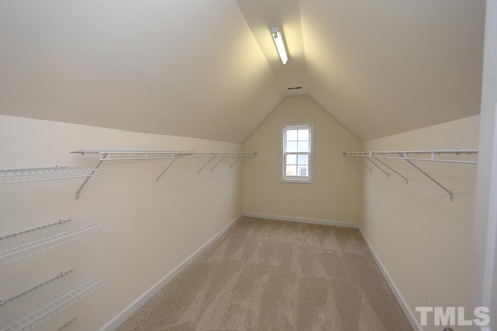 6020 Brambleberry Way Raleigh, NC 27616 - Photo 8 of 14 Huge walk-in closet is adjacent to master bath.