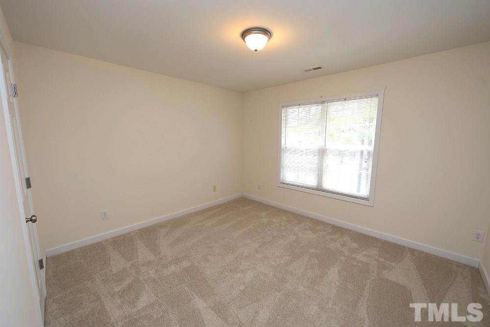 6020 Brambleberry Way Raleigh, NC 27616 - Photo 9 of 14 Nice sized secondary bedroom with large closet.