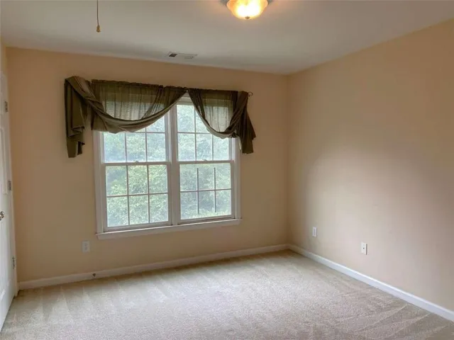 an empty room with a door