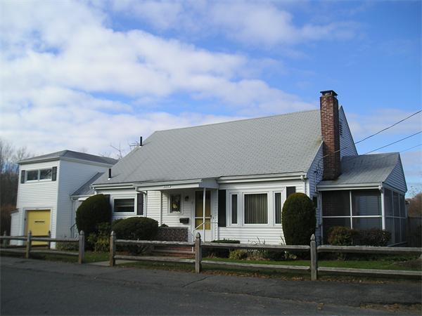 11 Warren Road Marblehead, MA 01945 - Photo 1 of 7 a front view of a house with a garden