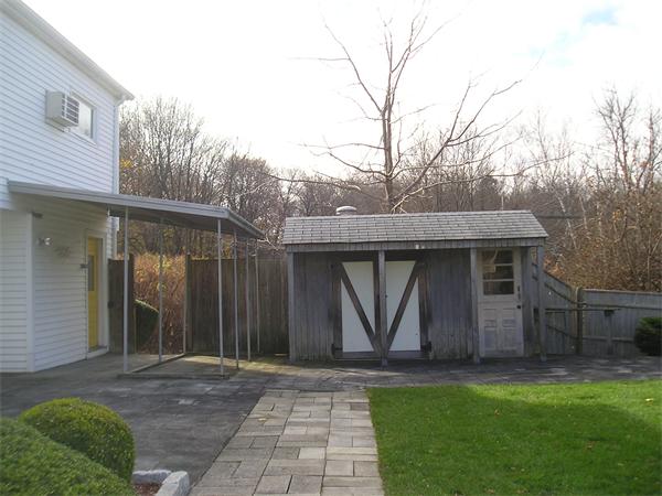 11 Warren Road Marblehead, MA 01945 - Photo 6 of 7 a front view of a house with garden