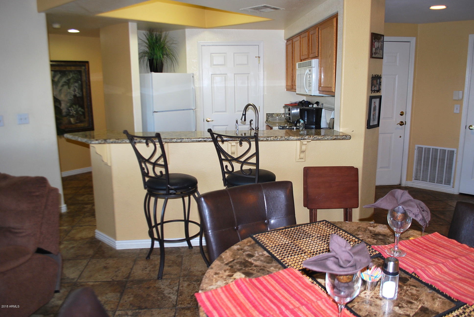 10030 West Indian School Road, Unit 158 Phoenix, AZ 85037 - Photo 11 of 28 a view of a livingroom with furniture