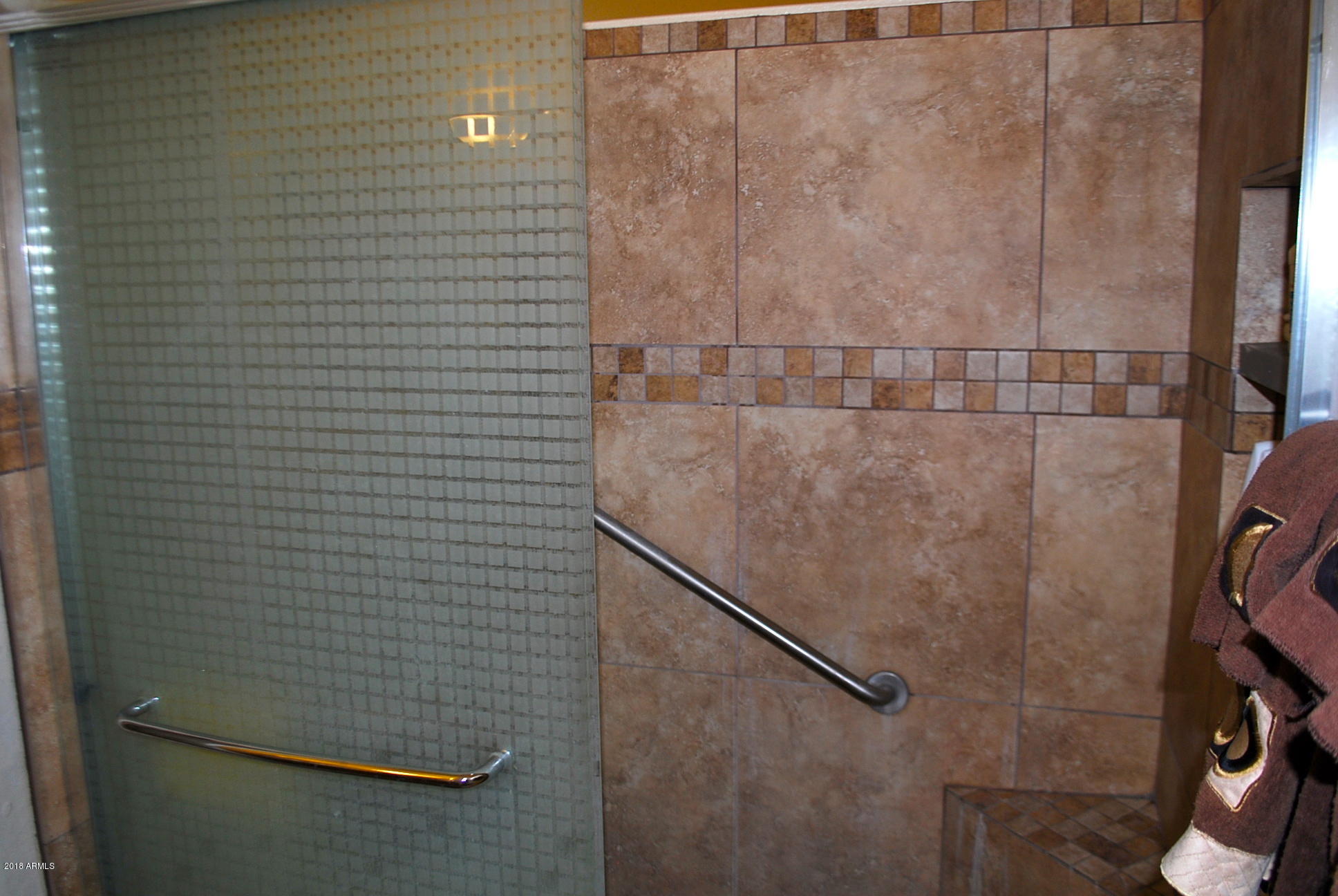 10030 West Indian School Road, Unit 158 Phoenix, AZ 85037 - Photo 18 of 28 a bathroom with a shower