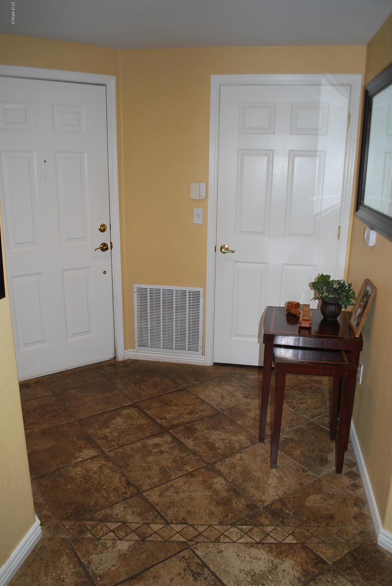 10030 West Indian School Road, Unit 158 Phoenix, AZ 85037 - Photo 23 of 28 a view of a bench in a room
