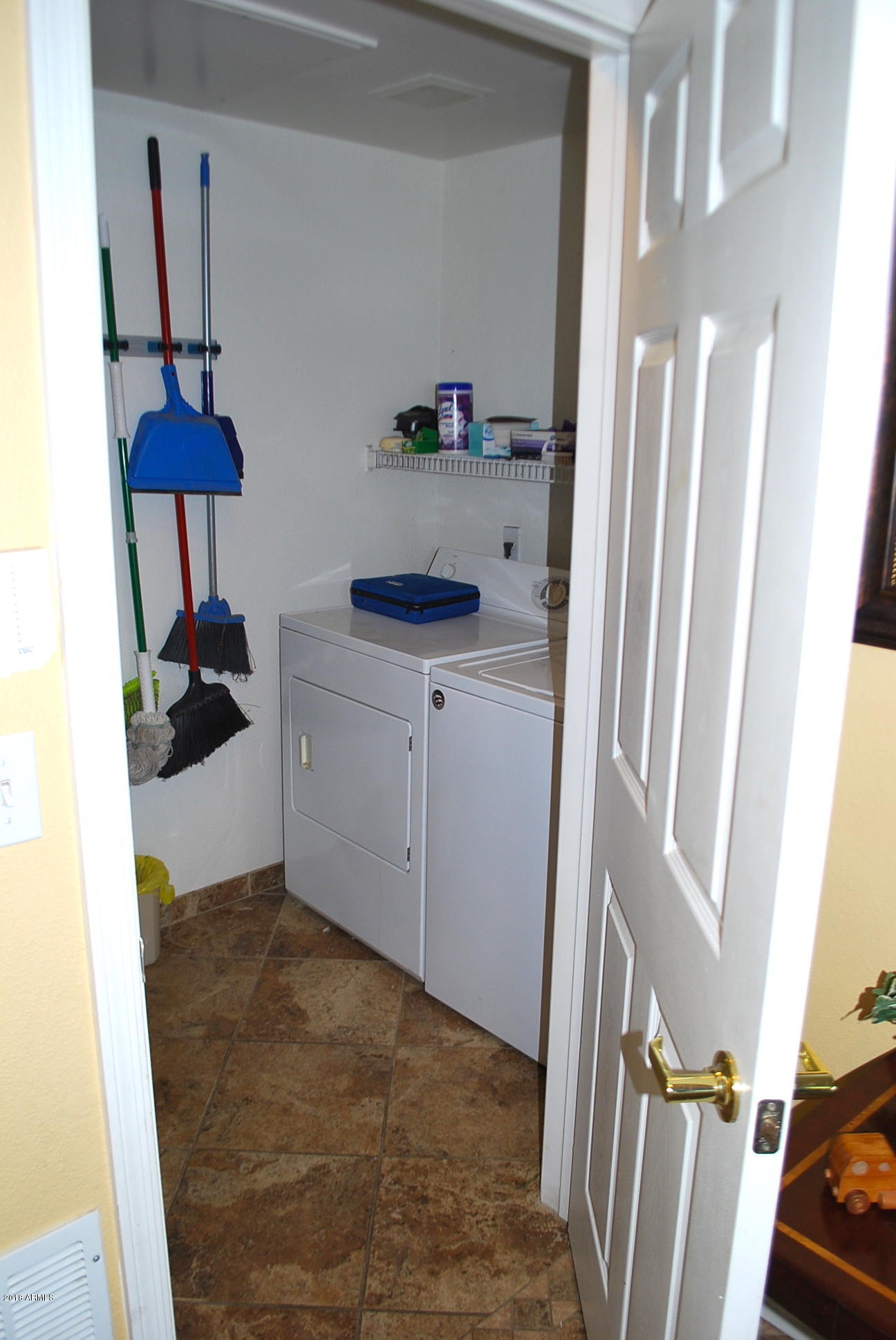 10030 West Indian School Road, Unit 158 Phoenix, AZ 85037 - Photo 24 of 28 a bathroom with a sink and a mirror