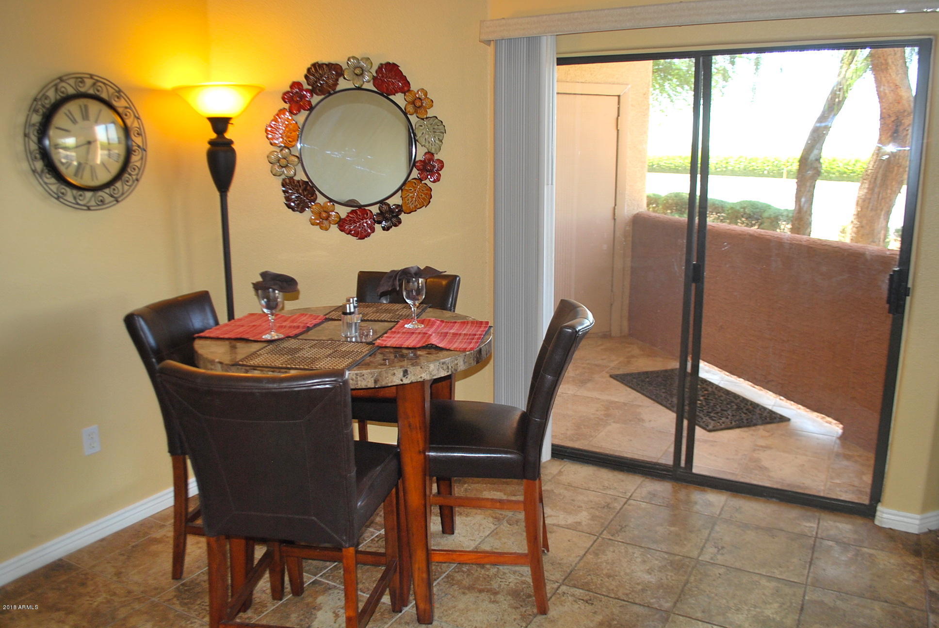 10030 West Indian School Road, Unit 158 Phoenix, AZ 85037 - Photo 3 of 28 a dining room with furniture and window