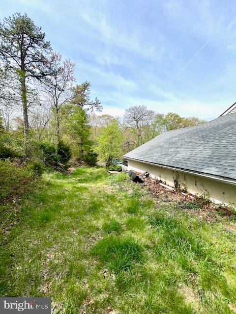 328 Red Pump Road Nottingham, PA 19362 - Photo 29 of 37 a view of a big yard with potted plants and large tree