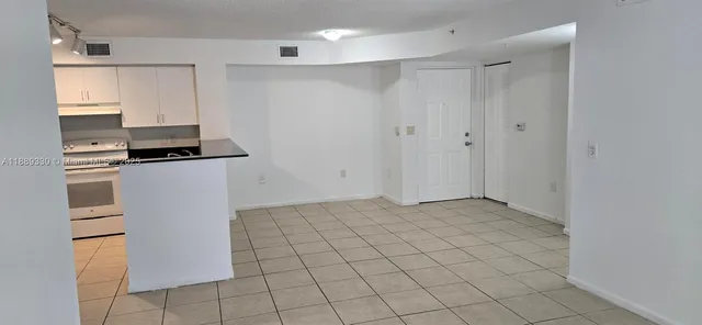 a view of a balcony and a floor to ceiling window