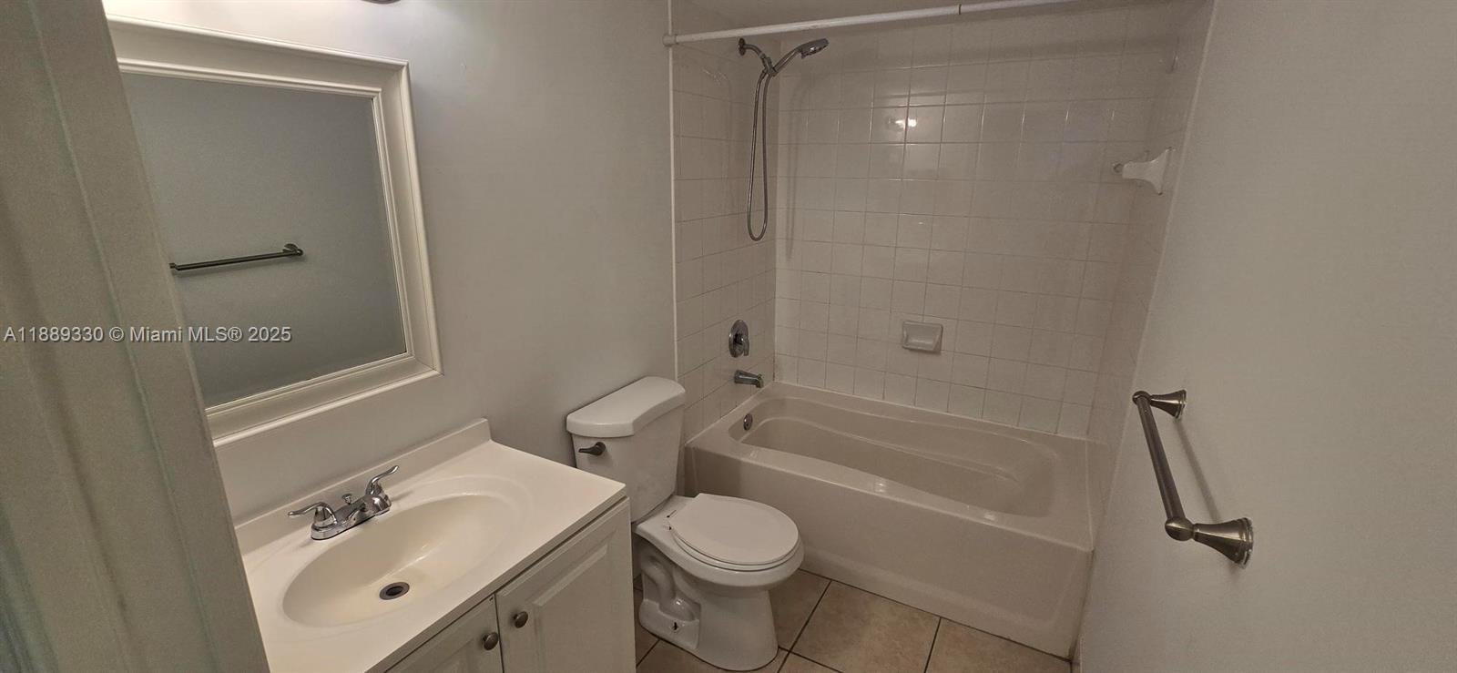 2173 Renaissance Boulevard, Unit 103 Miramar, FL 33025 - Photo 20 of 36 a bathroom with a sink toilet and shower