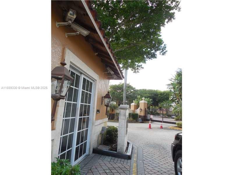 2173 Renaissance Boulevard, Unit 103 Miramar, FL 33025 - Photo 2 of 36 a view of balcony with couch