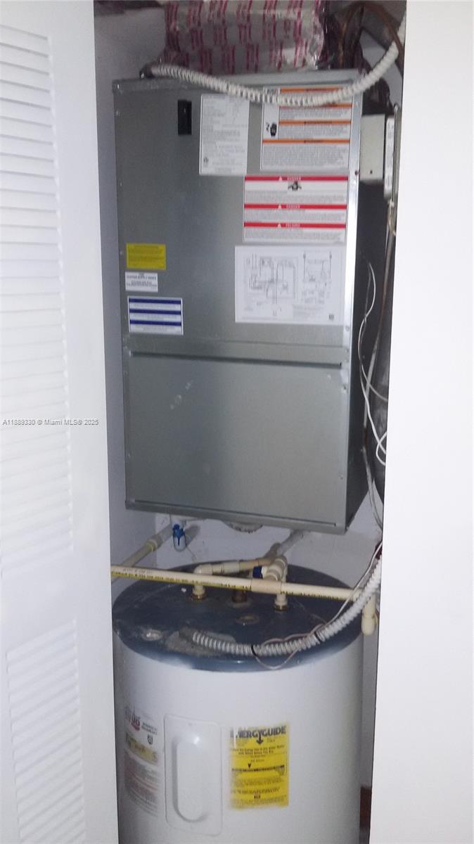2173 Renaissance Boulevard, Unit 103 Miramar, FL 33025 - Photo 26 of 36 a view of water heater