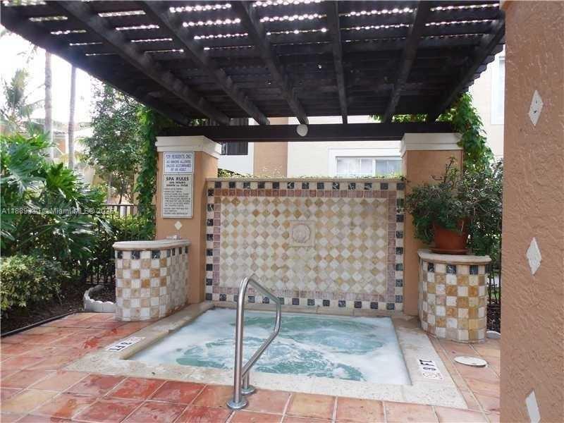 2173 Renaissance Boulevard, Unit 103 Miramar, FL 33025 - Photo 30 of 36 a view of entryway with outdoor space