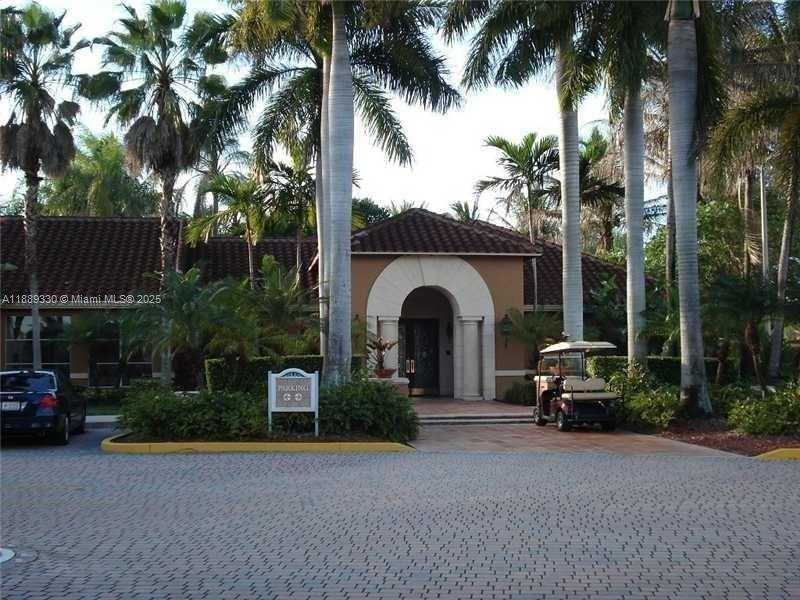 2173 Renaissance Boulevard, Unit 103 Miramar, FL 33025 - Photo 3 of 36 a house view with a garden space