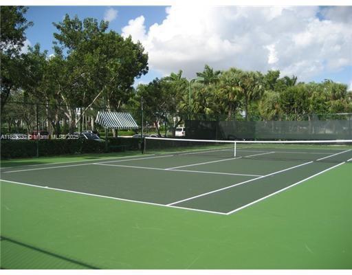 2173 Renaissance Boulevard, Unit 103 Miramar, FL 33025 - Photo 33 of 36 a view of a tennis court