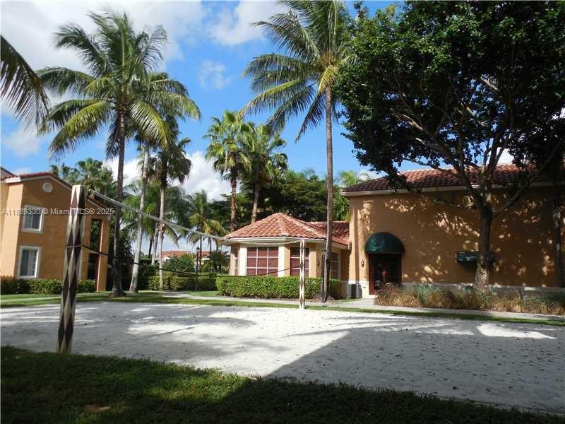 2173 Renaissance Boulevard, Unit 103 Miramar, FL 33025 - Photo 36 of 36 a front view of house with yard