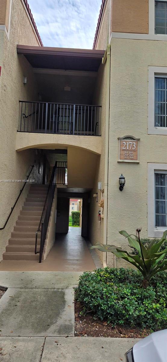 2173 Renaissance Boulevard, Unit 103 Miramar, FL 33025 - Photo 6 of 36 a view of a balcony