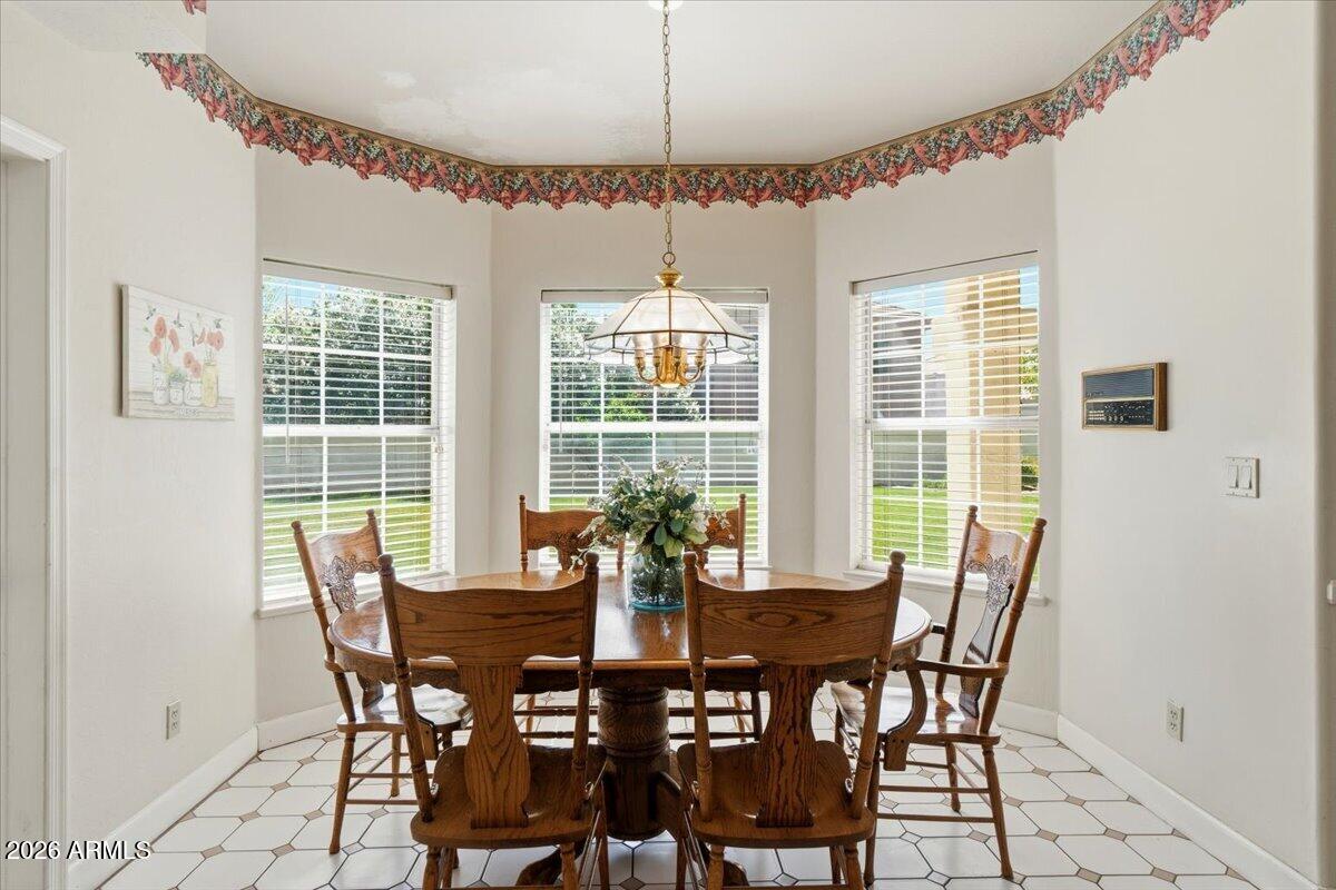 1919 East Clipper Court Gilbert, AZ 85234 - Photo 21 of 62 a view of a dining room with furniture window and outside view