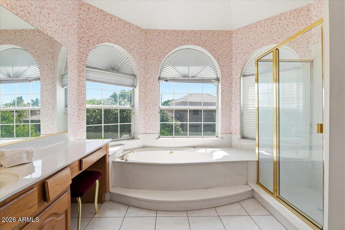 1919 East Clipper Court Gilbert, AZ 85234 - Photo 30 of 62 a large bathroom with a bathtub and large window