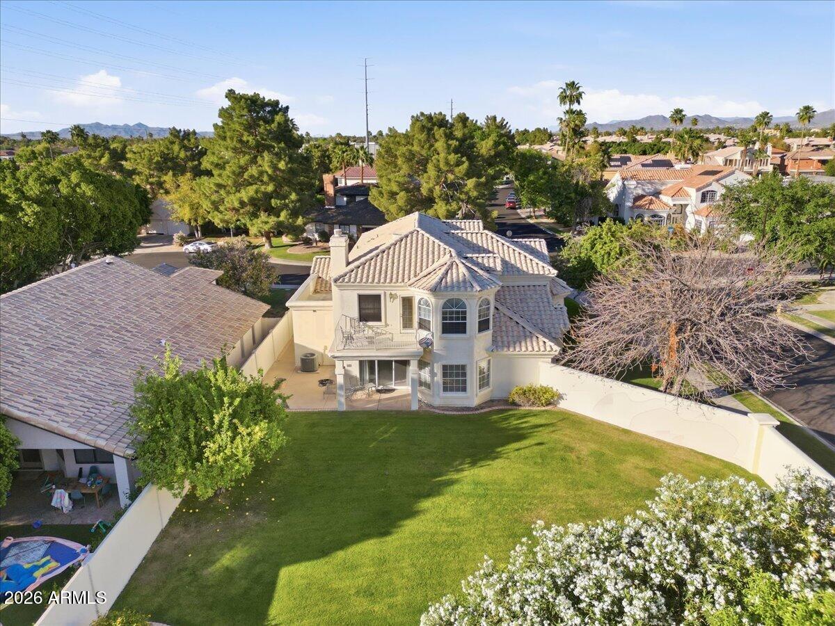 1919 East Clipper Court Gilbert, AZ 85234 - Photo 49 of 62 a aerial view of a house with swimming pool garden and patio