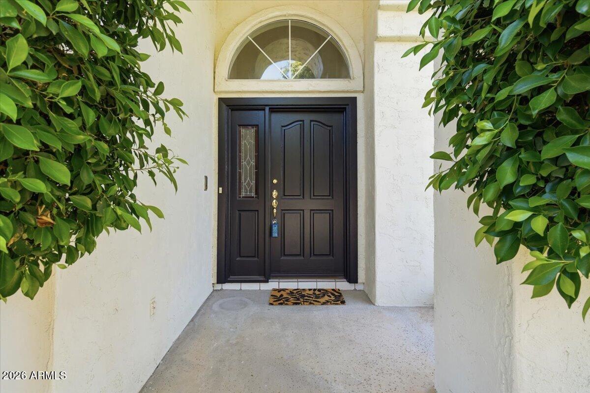 1919 East Clipper Court Gilbert, AZ 85234 - Photo 6 of 62 an entrance to house with yard and green space
