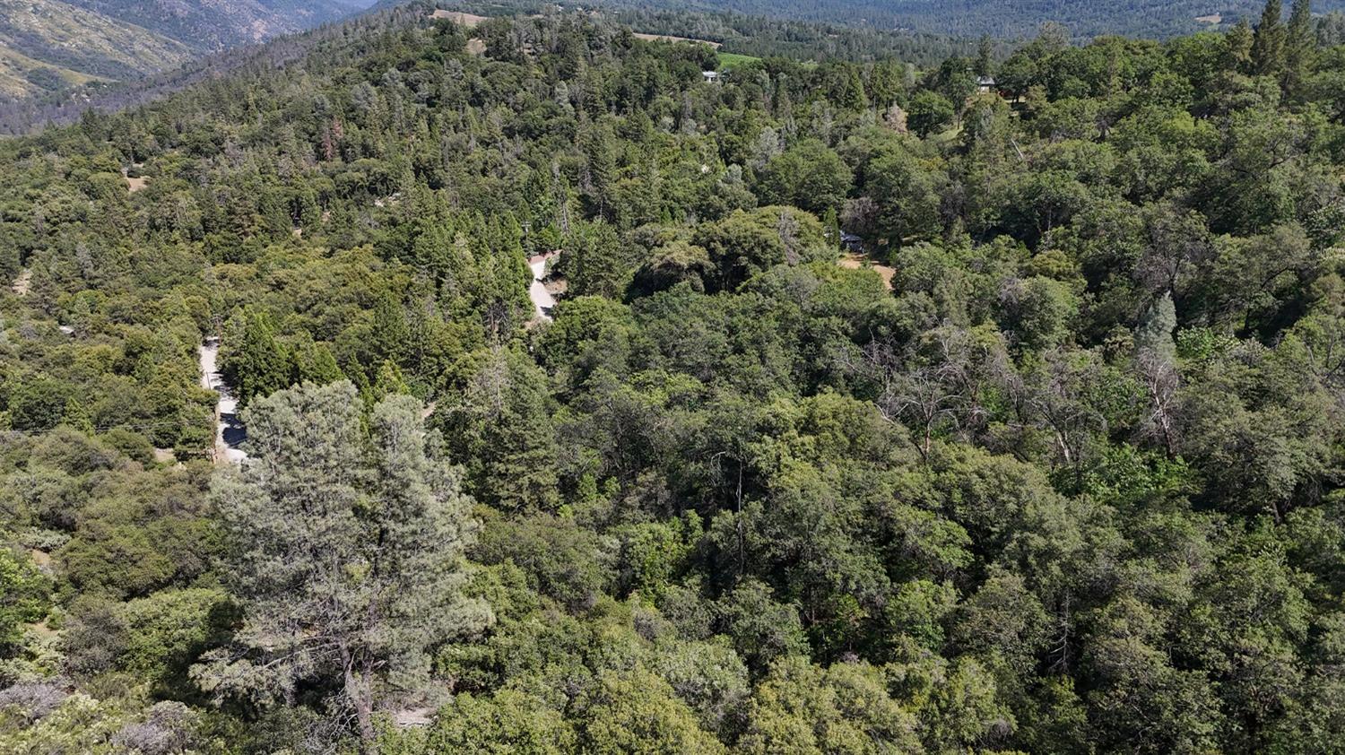 6860 Ant Hill Road Somerset, CA 95684 - Photo 32 of 40 an aerial view of a house with a yard