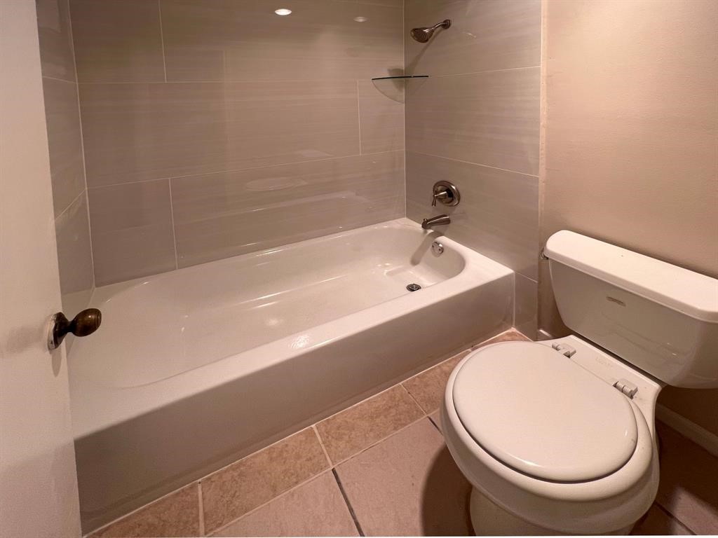 3122 Windmill Street Sugar Land, TX 77479 - Photo 11 of 13 a bathroom with a sink and a toilet