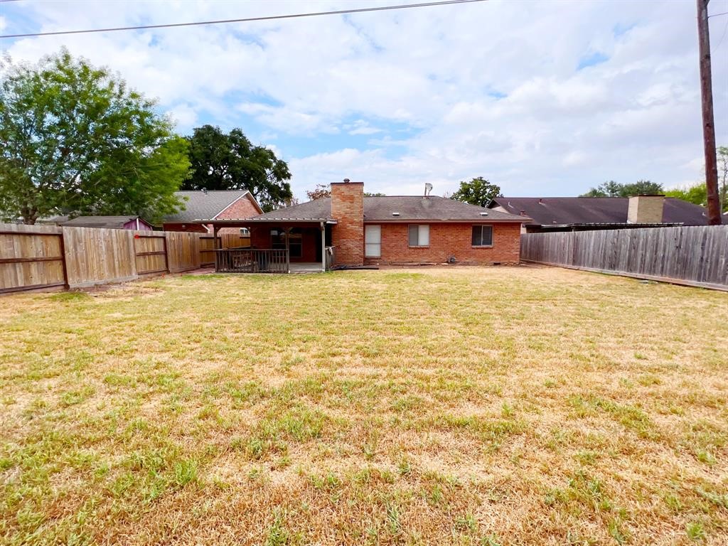 3122 Windmill Street Sugar Land, TX 77479 - Photo 13 of 13 a swimming pool with trees in front of it