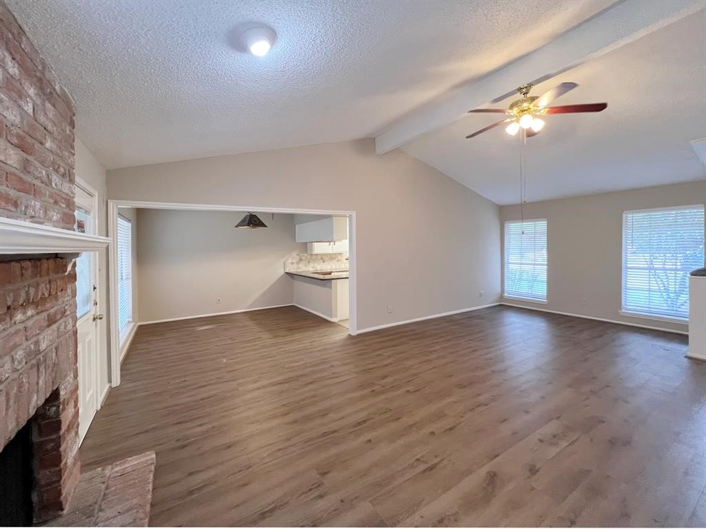 3122 Windmill Street Sugar Land, TX 77479 - Photo 3 of 13 a view of empty room with wooden floor and fan