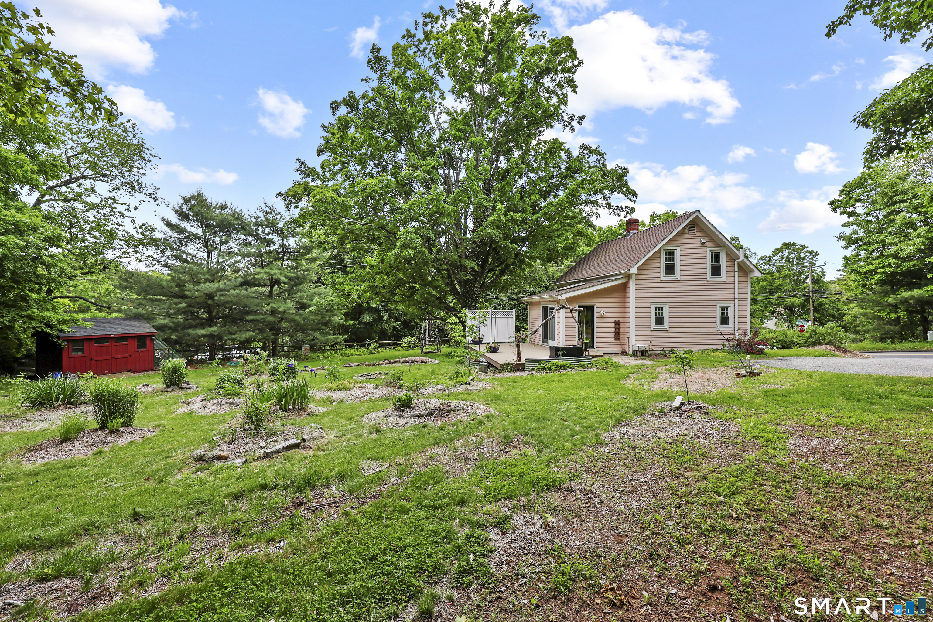 917 Hopewell Road Glastonbury, CT 06033 - Photo 30 of 39 a view of house with backyard