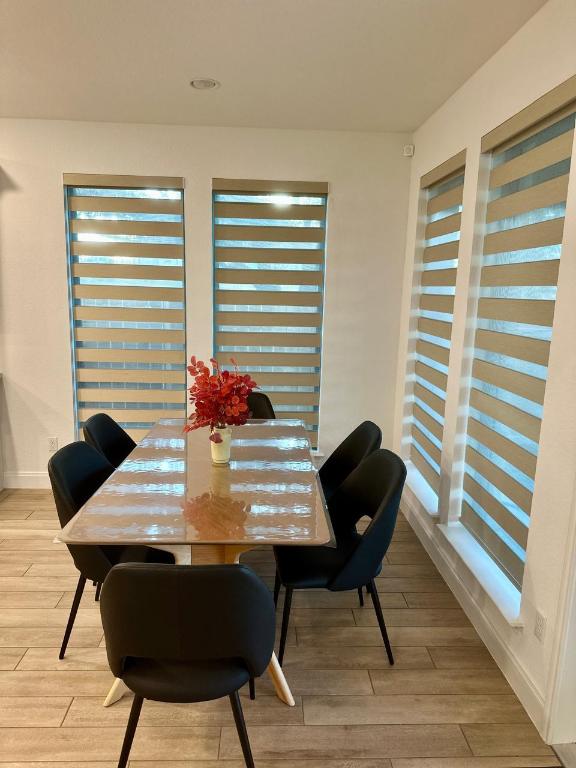 1113 Scenic Grn Loop Georgetown, TX 78628 - Photo 12 of 38 a view of a dining room with furniture and wooden floor